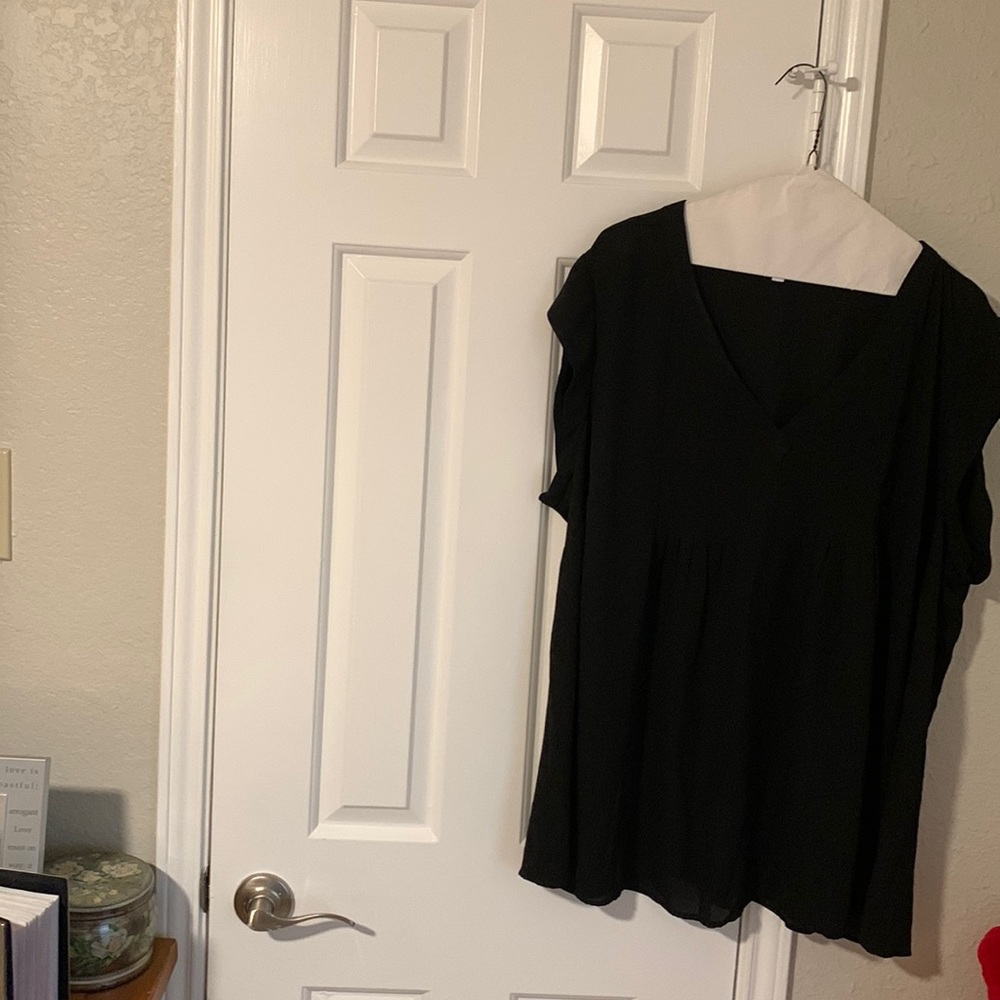 Beautiful lightweight black blouse. Cap sleeves. Worn only a few times. Size 3x